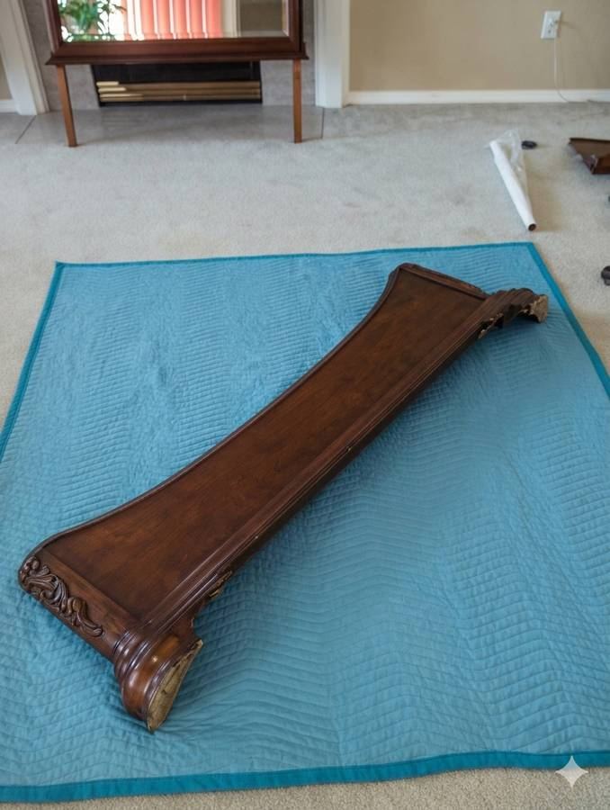 Table leg carefully disassembled and padded before a move